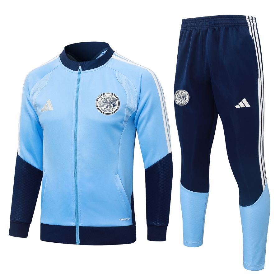 Survetement Ajax Veste 2026 2027 Bleu Ciel (1) Survetement Ajax Veste 2026 2027 Bleu Ciel (1)
