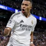 Kylian Mbappé celebrates a goal with Real Madrid at the Santiago Bernabéu during a La Liga match.